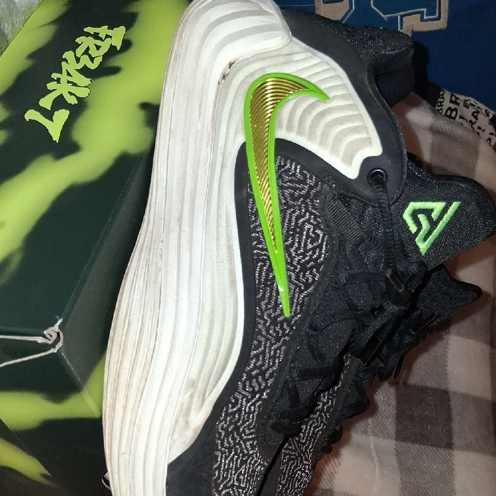 Nike Black Sneakers with Bright Green Swoosh and White Midsole
